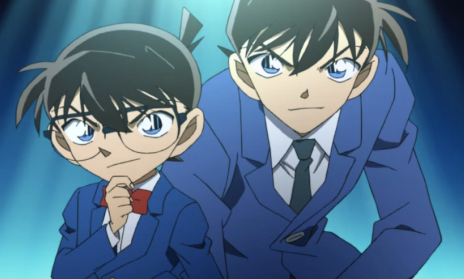 Detective Conan and Shinichi Kudo posing in school uniform